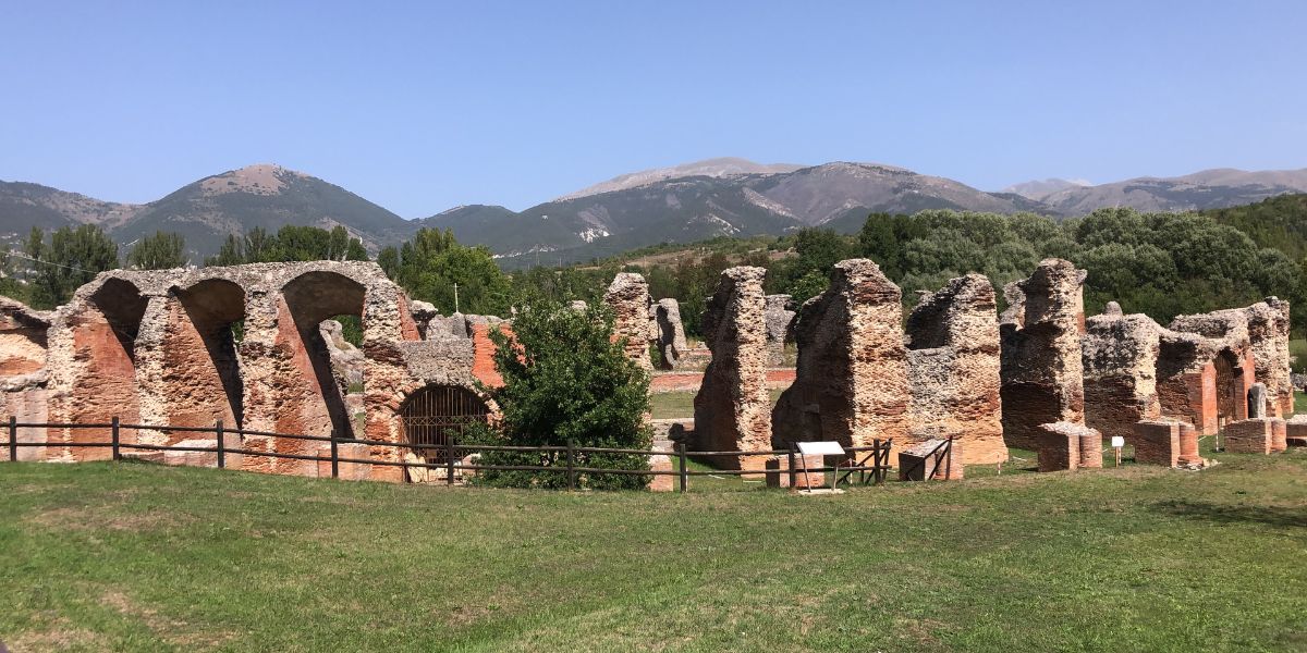 Aquila colloseum Roman Colossseum. I'd write more, but I have to meet my friends for a huge breakfast buffet in 2 minutes then pack the gravel bike bags to head up into those mountains.