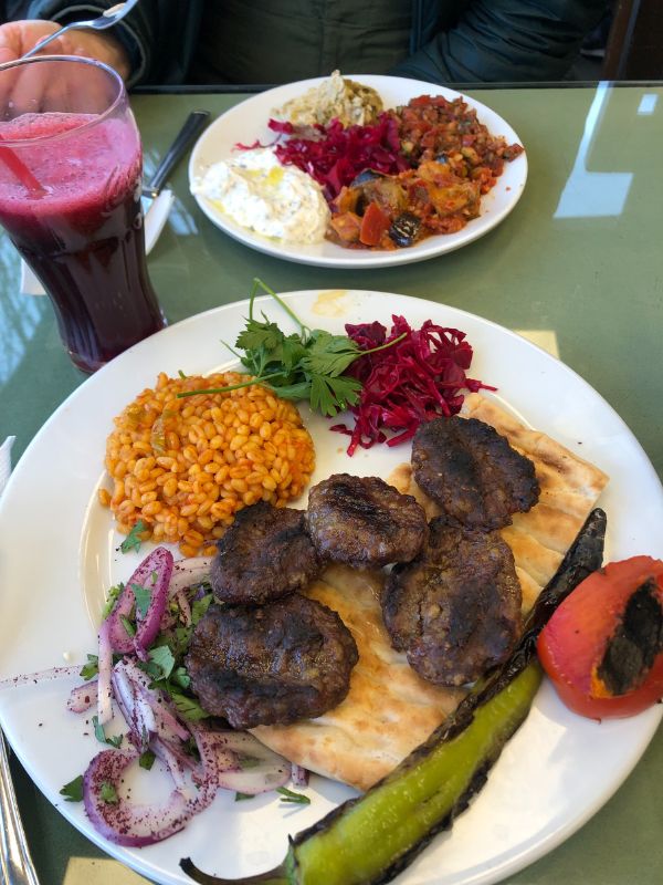 A single order of Kofta meat patties comes with all these sides (and mulberry juice)