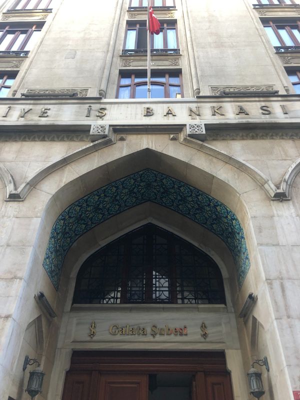 Benefits of living local and moving slow - it wasn't until the 10th time passing this bank that I noticed the tile work under the arch