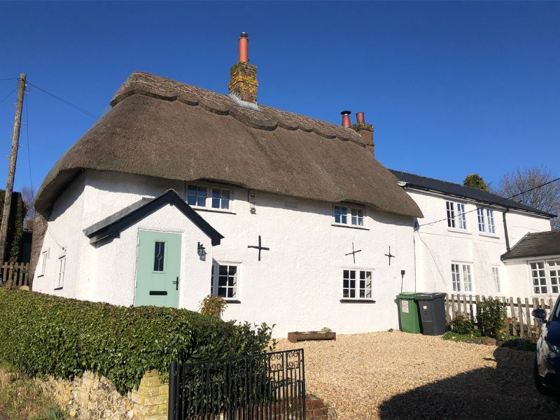Another house in town with traditional thatched roof
