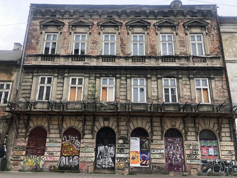 2 Despite the vibrant tourist industry, much of the Jewish Quarter has never recovered from the Holocaust, with many buildings like this still boarded up.