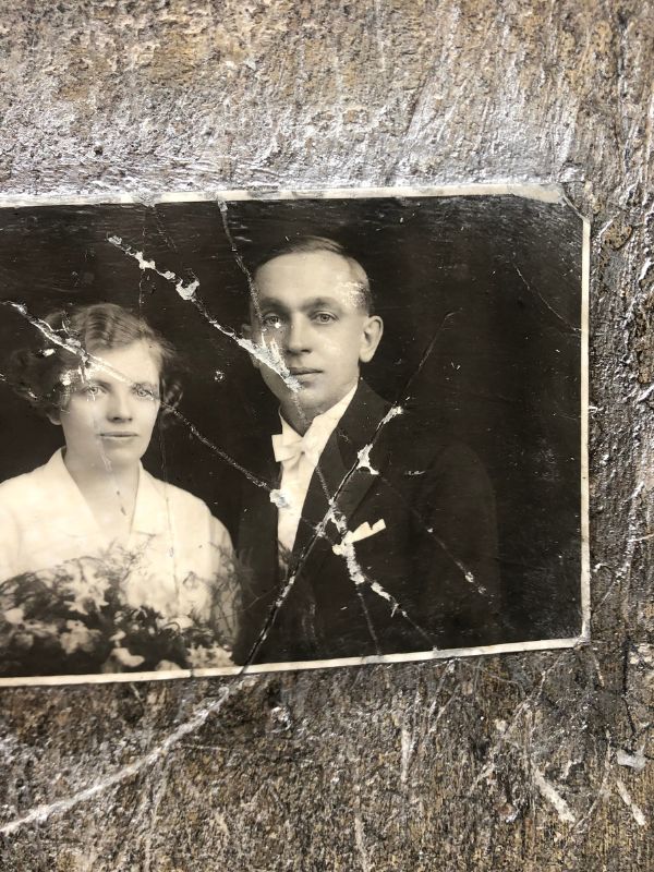 3 Young couple memorialized in a tattered photo...