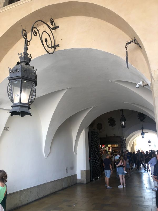 3 When this Cloth Market was built, one architect killed the other arthitect - his brother - whose tower was taller than his. At the dedication, he killed himself out of remorse with the same fratracide knife, which now hangs above this entrance (top right)