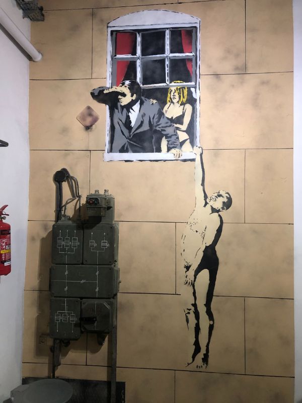 4 "Well hung lover (Naked Man Hanging From Window)"