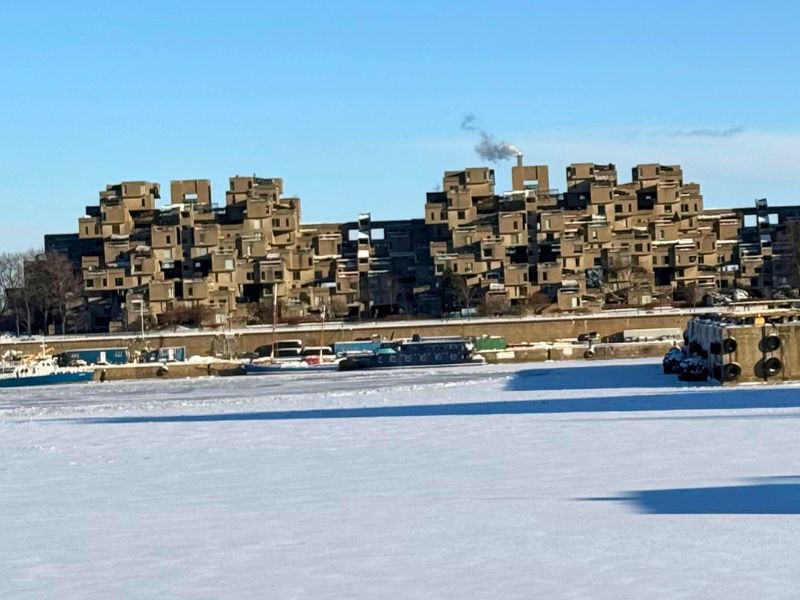 Habitat 67, designed by Moshe Safdie, was Montreal's iconic, experimental housing project for the 1967 World's Fair (Expo 67), featuring 354 prefabricated concrete modules stacked to create 148 residences with gardens and privacy, aiming to blend high-density living with suburban quality.