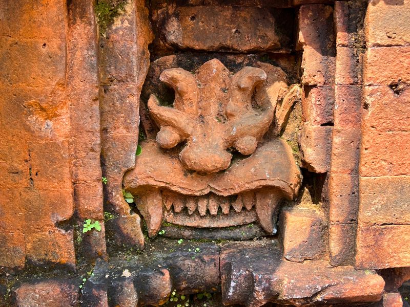 52 of these scary smily faces surround one temple to keep out evil spirits