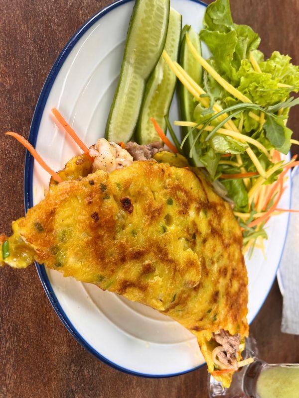 Bánh xèo” rice pancake stuffed with shrimp and pork - 90,000 dong