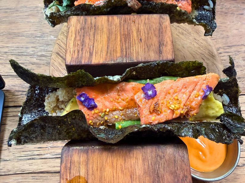 Salmon rolled in seaweed snacks