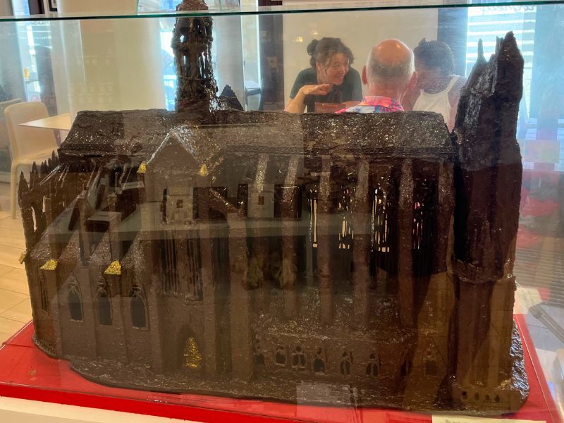 Chocolate and macarons behind a chocolate cathedral